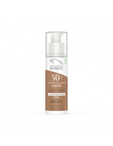 Crema solar facial color dorado FPS...