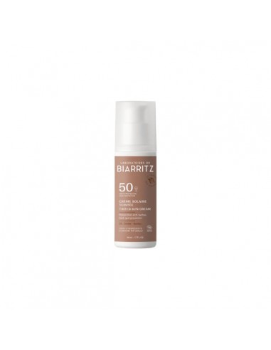 Crema facial solar FPS50 color dorado...