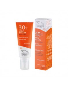 Spray solar cara y cuerpo...